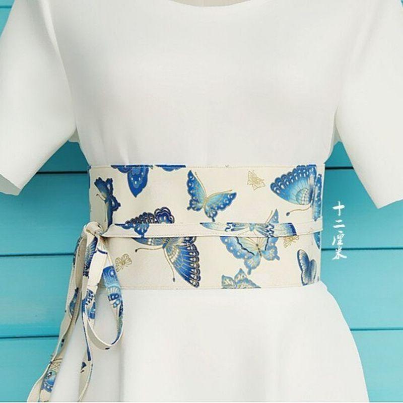 Hvitt Obi belte med Sommerfuglmotiv Hvitt Obi belte med Sommerfuglmotiv