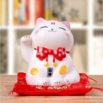 japansk maneki neko lykkelig