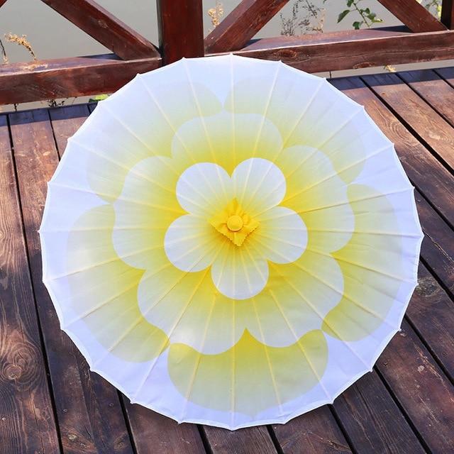 japansk paraply med gul blomst japansk paraply med gul blomst